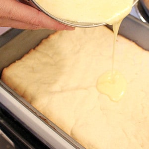pouring in the lemon topping