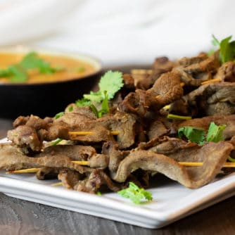 These grilled Thai beef satay skewers are the perfect Thai appetizer and great served with peanut sauce.