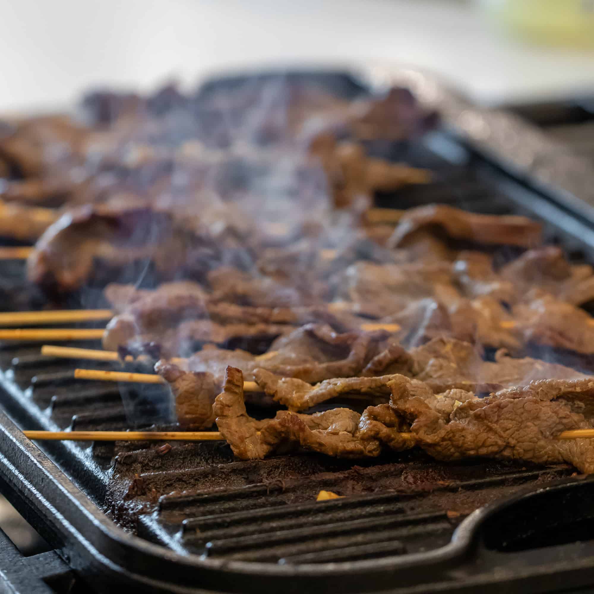 Cook the beef stay skewers on an outdoor or indoor grill.