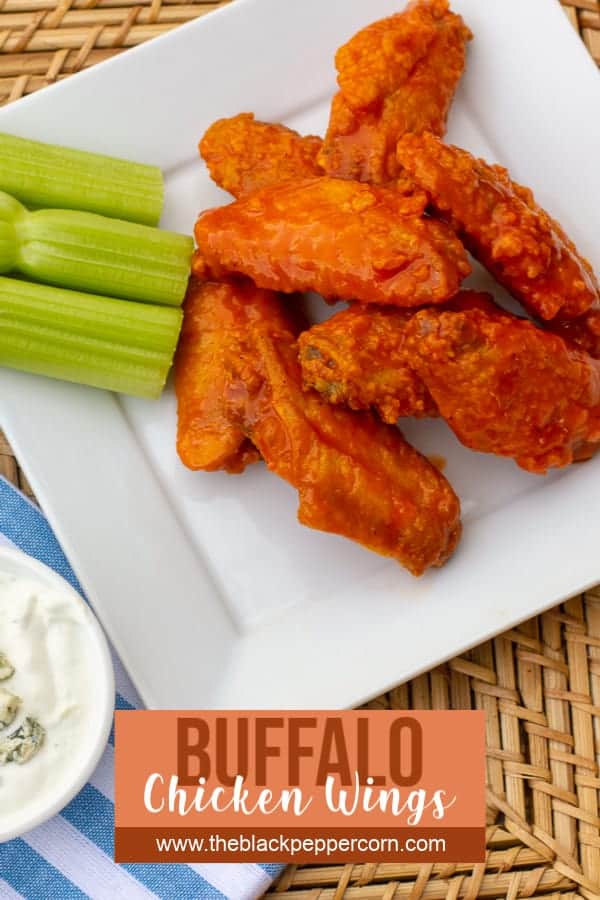 Restaurant style buffalo chicken wings made at home. Easy to prepare wings recipe with a traditional hot and spicy sauce. Great deep fried tail gate party snack.