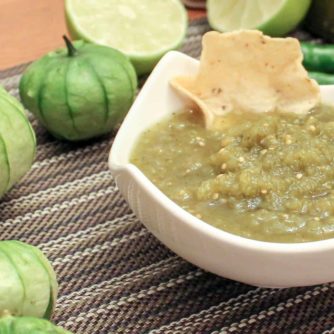 A spicy green salsa recipe made with tomatillos, cilantro, jalapeno or serrano peppers and lime juice. Great with nacho chips, enchiladas, taco, burritos and more!