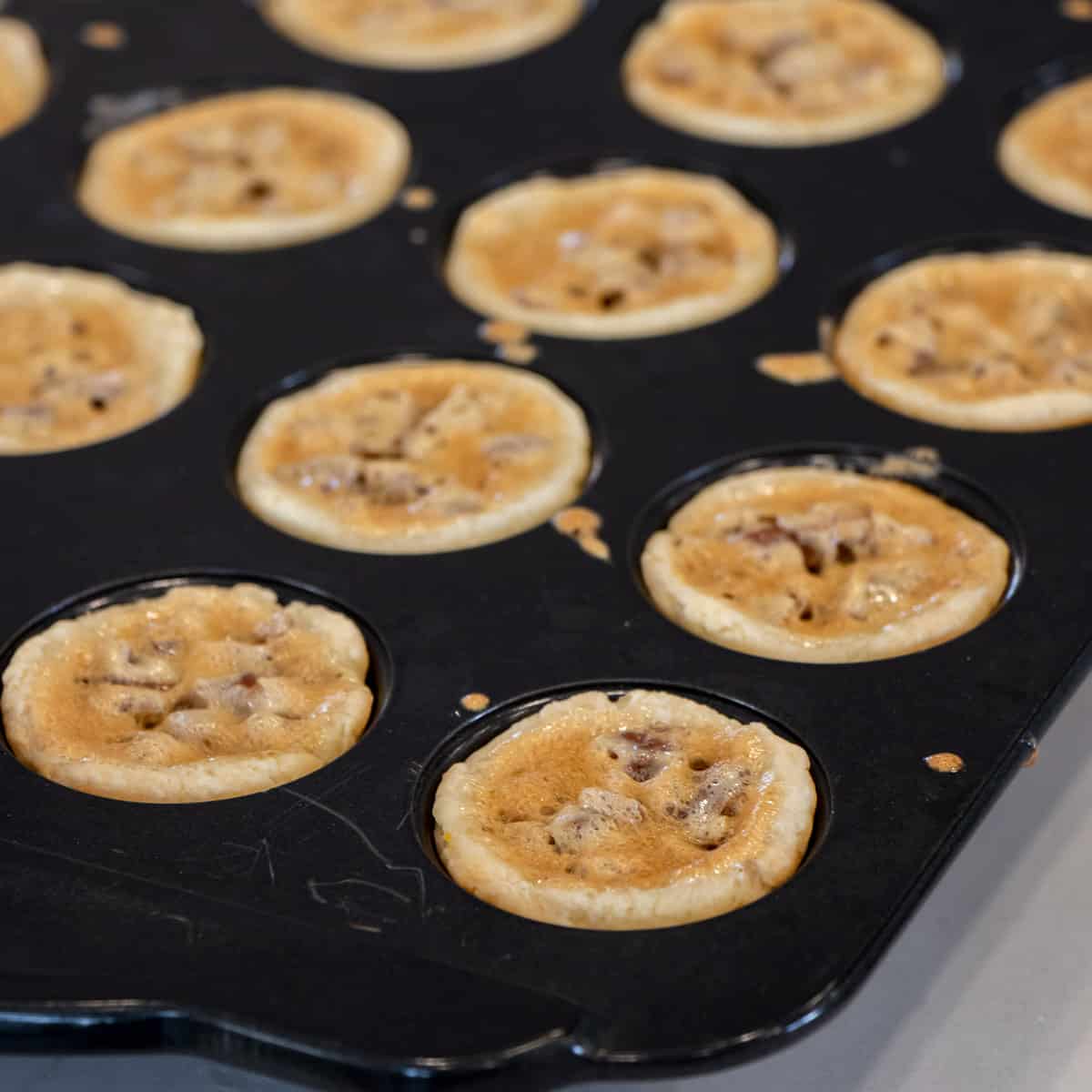 Perfectly baked desserts cooling in the tray before removing.