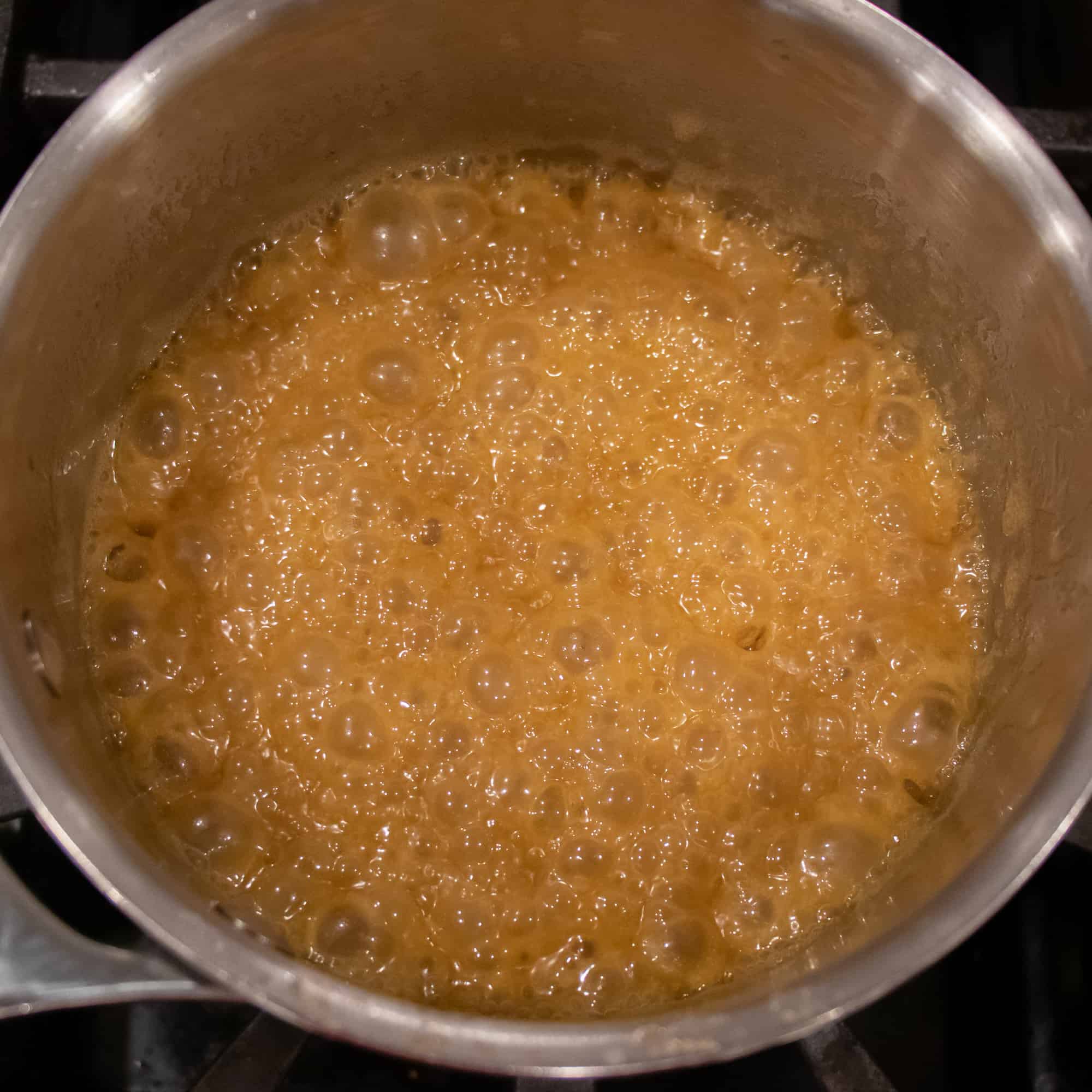 Let the caramel mixture bubble for 2 minutes.