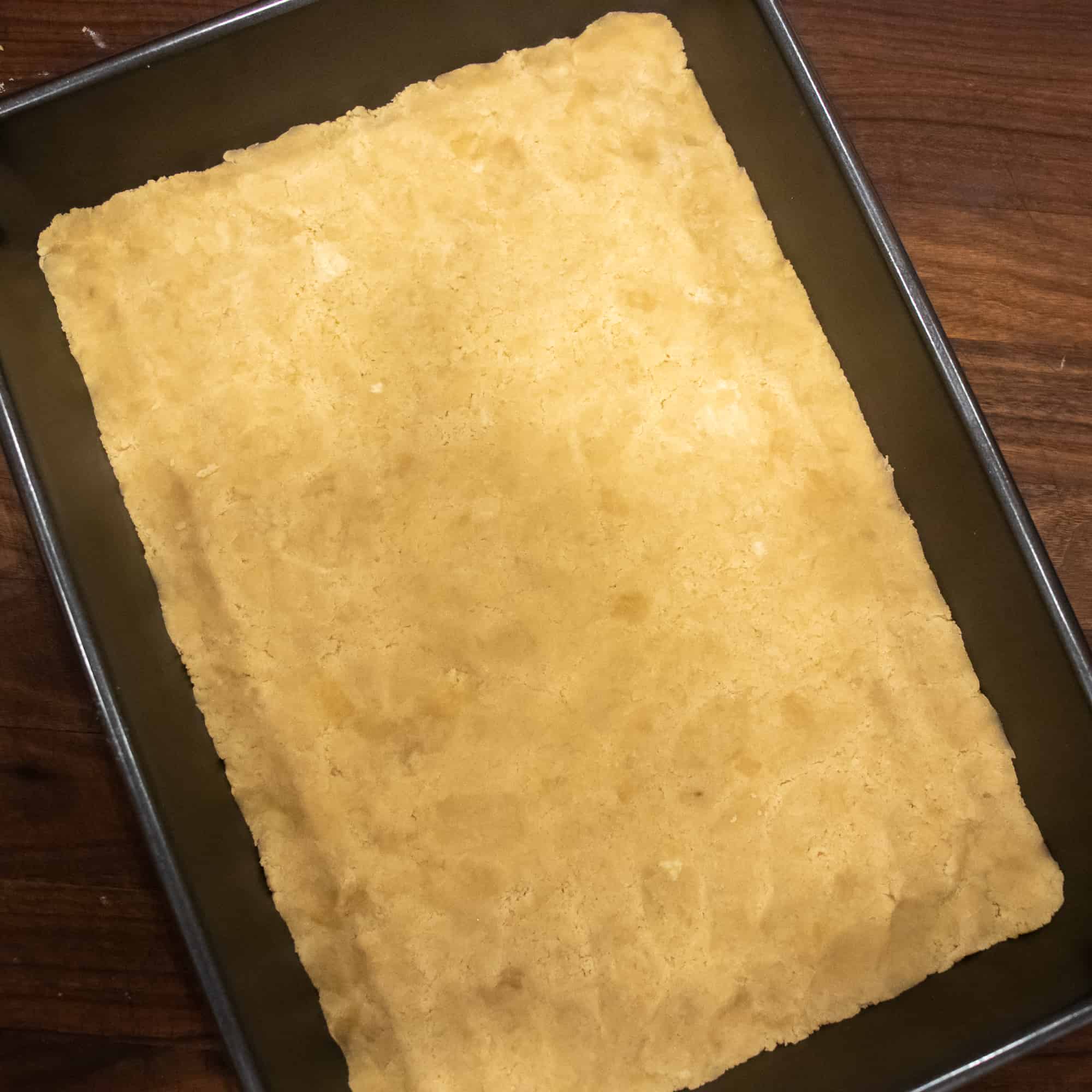 Press the dough into a 13x9 baking dish.