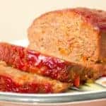 Crumbled bacon is mixed in with the ground beef to 'baconate' this meatloaf recipe. Full of flavour, this meatloaf will not dissapoint for those who love bacon!