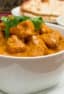 A classic mild Indian curry! Chicken marinated in yogurt and spices then grilled on the BBQ tandoori style. Served in a tikka sauce of tomato, cream and spices.