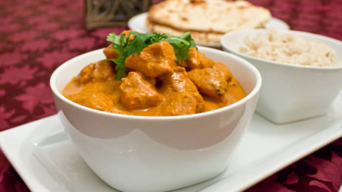 A classic mild Indian curry! Chicken marinated in yogurt and spices then grilled on the BBQ tandoori style. Served in a tikka sauce of tomato, cream and spices.