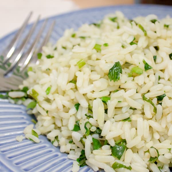 Simple side dish recipe for rice tossed with minced cilantro and lime juice. Serve with Mexican food, stir fry, Indian curry or Thai cuisine.