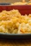 Easy recipe for how to make homemade mac and cheese with a crumble topping. Macaroni pasta noodles with a creamy three cheese sauce of cheddar, mozzarella and parmesan.