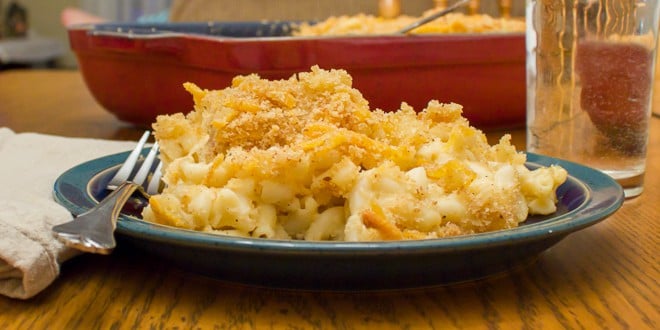 Easy recipe for how to make homemade mac and cheese with a crumble topping. Macaroni pasta noodles with a creamy three cheese sauce of cheddar, mozzarella and parmesan.