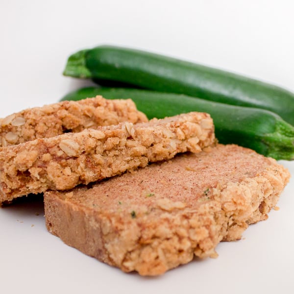 A moist zucchini loaf with cinnamon, and a hint of nutmeg and cloves. Topped with a crumble topping of oats, brown sugar, butter and cinnamon. Delicious!!