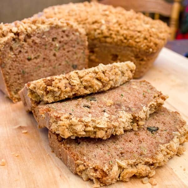 A moist zucchini loaf with cinnamon, and a hint of nutmeg and cloves. Topped with a crumble topping of oats, brown sugar, butter and cinnamon. Delicious!!