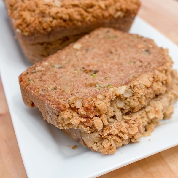 A moist zucchini loaf with cinnamon, and a hint of nutmeg and cloves. Topped with a crumble topping of oats, brown sugar, butter and cinnamon. Delicious!!