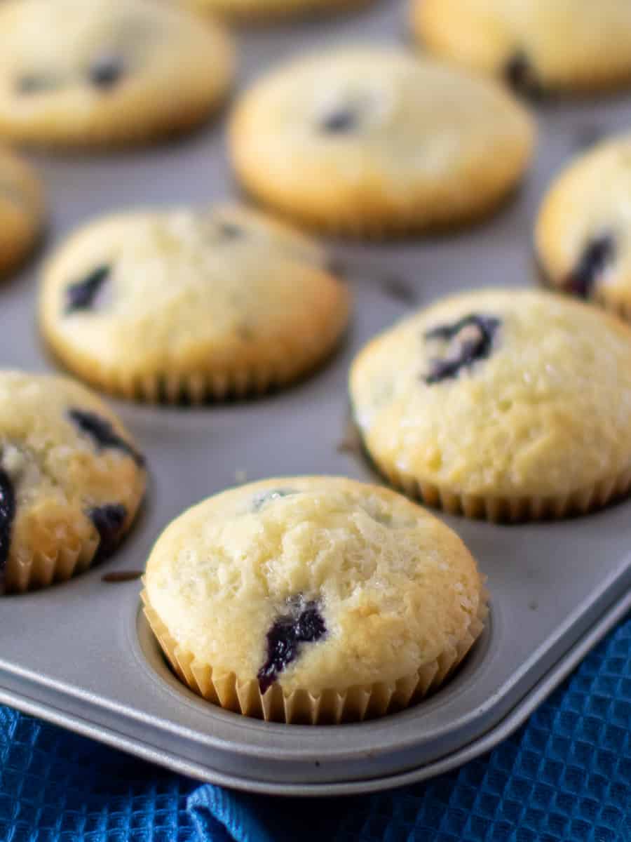 Tall image of fresh muffins.