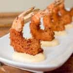 This deep fried shrimp recipe has a crispy breading of panko and coconut. The Thai mayo has tang from lime juice and heat from sriracha sauce and is the perfect dip for these delicious shrimp.