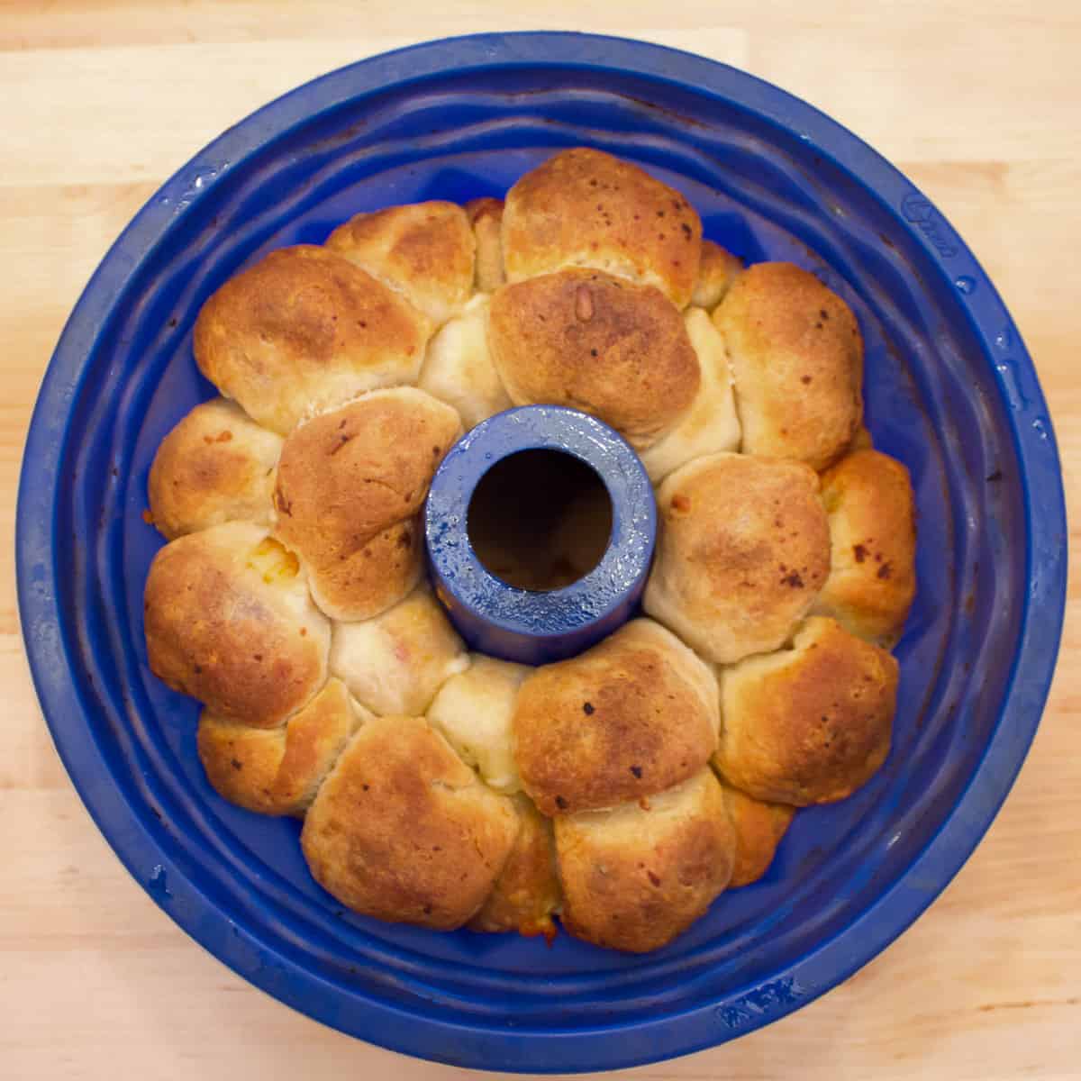 Monkey bread baked and ready to be removed from the bundt pan.