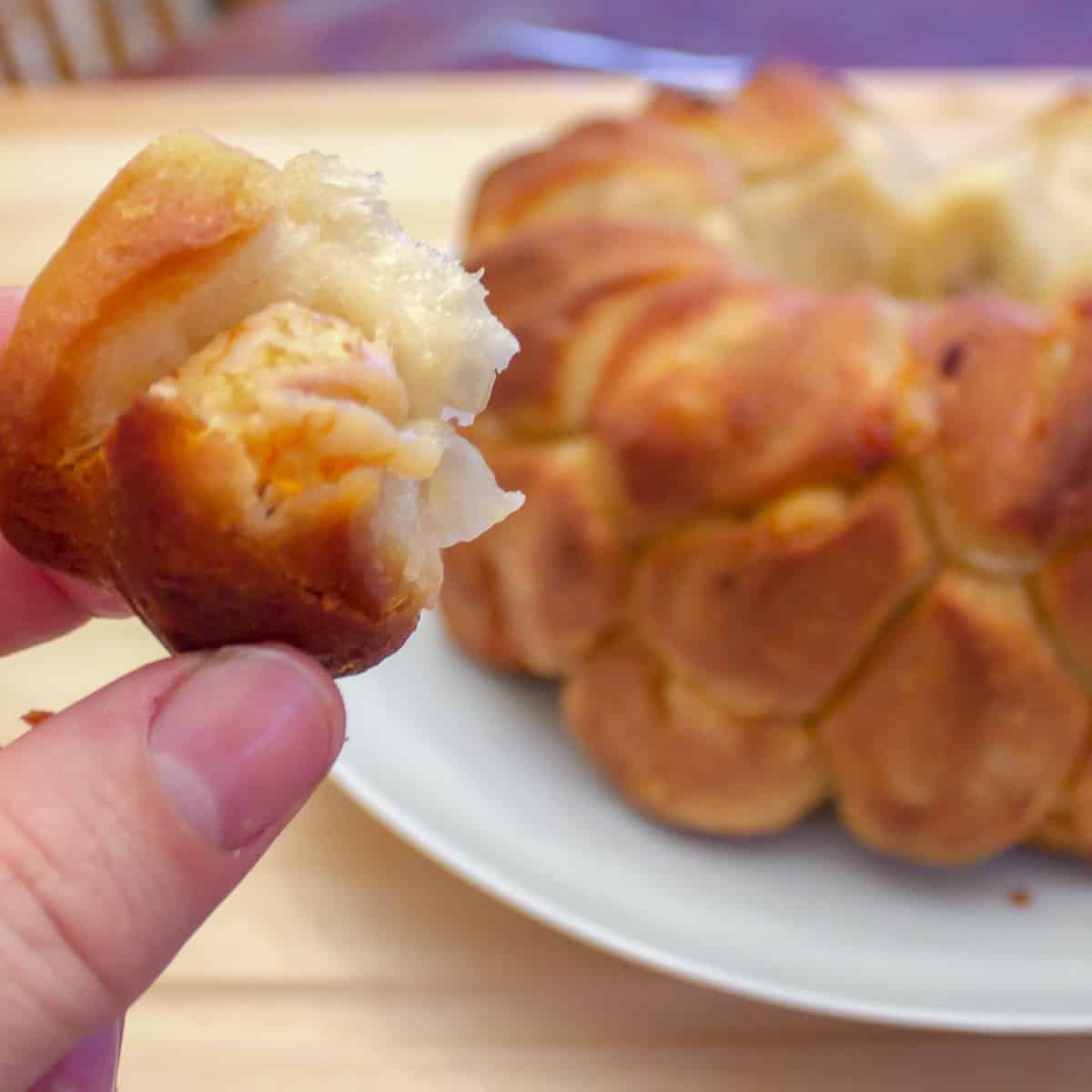 A bite sized biscuit stuffed with seafood and cheese.