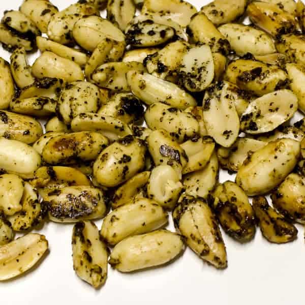 These roasted peanuts have the tang of lemon and the spice of pepper. The recipe is easy to make and only take 20 minutes to roast in the oven.