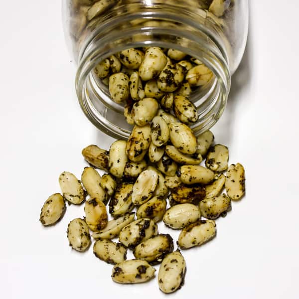 These roasted peanuts have the tang of lemon and the spice of pepper. The recipe is easy to make and only take 20 minutes to roast in the oven.