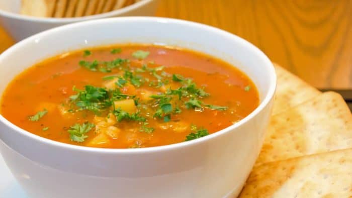This Manhattan version of clam chowder soup recipe has a tomato broth with potatoes, celery and onions. You can use fresh, canned or frozen clams. The soup is easy to make and it tastes delicious!