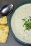 This New England Clam Chowder is rich and creamy. There are lots of minced clams and cubed potatoes in this hearty soup and the heavy cream make the broth silky smooth.