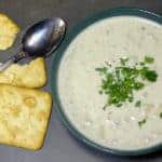 This New England Clam Chowder is rich and creamy. There are lots of minced clams and cubed potatoes in this hearty soup and the heavy cream make the broth silky smooth.