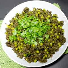 Minced beef and peas in an Indian curry sauce with fresh cilantro. Garam masala, cardamom pods, cumin, chilies, ginger and garlic make up this curry paste.