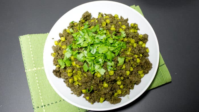 Minced beef and peas in an Indian curry sauce with fresh cilantro. Garam masala, cardamom pods, cumin, chilies, ginger and garlic make up this curry paste.