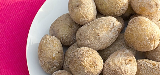 Overhead picture of salted potatoes in a bowl