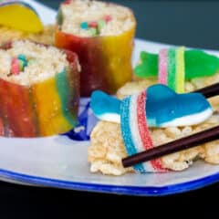 Instructions for how to make candy sushi with Rice Krispie treats, fruit roll ups, gummy worms, swedish fish, licorice strings and gummy sharks.