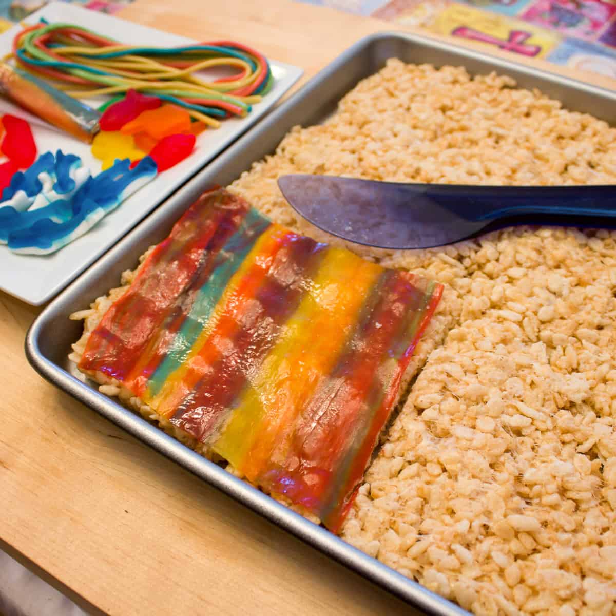 Place a fruit roll up sheet on the rice krispie squares.