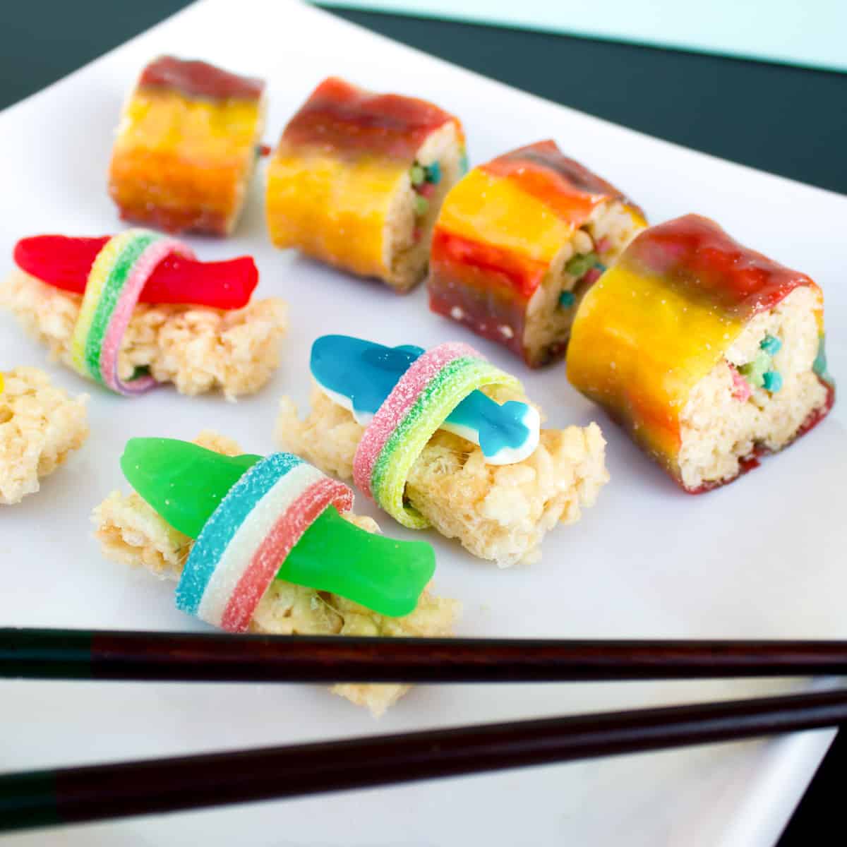 Instructions for how to make candy sushi with Rice Krispie treats, fruit roll ups, gummy worms, swedish fish, licorice strings and gummy sharks.