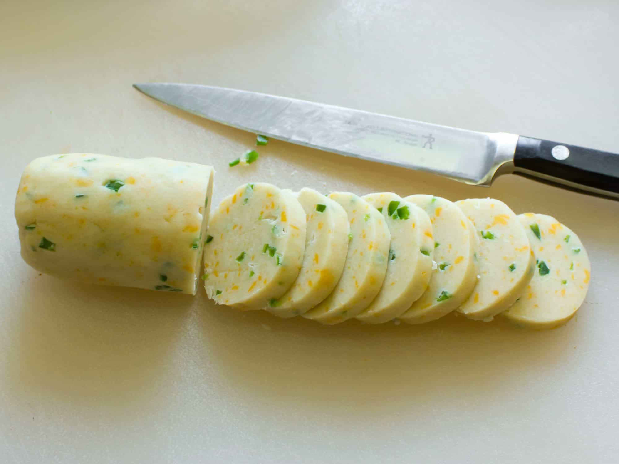 Cut the cookie dough logs into slices about half inch thick