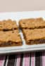 Classic chocolate chip recipe with Skor butter crunch toffee pressed on a sheet, baked and cut into bars. These cookie squares go great with coffee or milk.