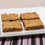 Classic chocolate chip recipe with Skor butter crunch toffee pressed on a sheet, baked and cut into bars. These cookie squares go great with coffee or milk.