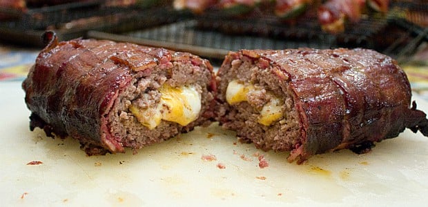 This recipe uses ground beef stuffed with cheddar cheese and shaped into a log. The beef is then wrapped by a bacon weave and smoked until cooked and gooey! Great tailgate food!