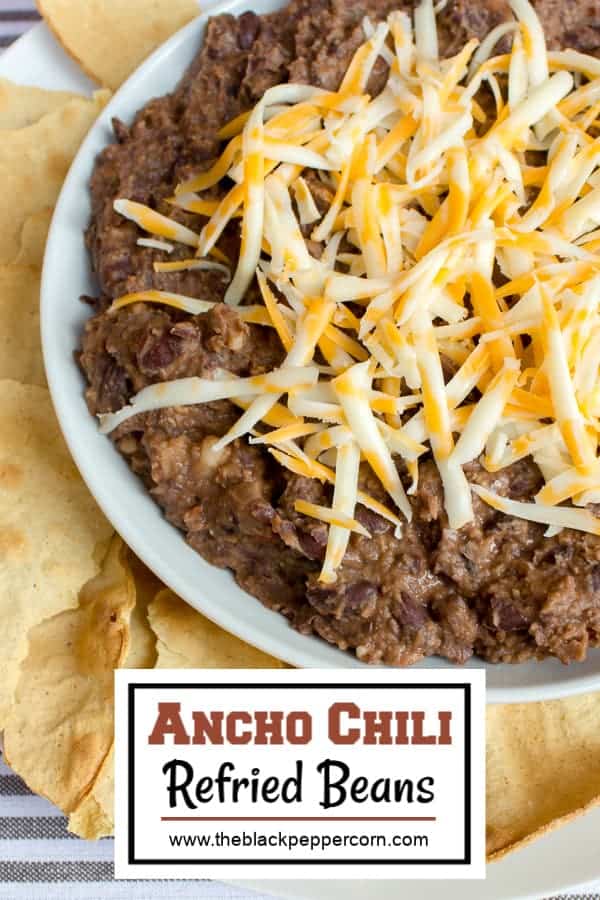 Refried beans made with black beans and ancho chilies. Great with nacho chips and cheddar cheese. Can also be made with pinto beans or red kidney beans.