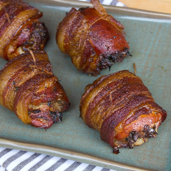 Smoked chicken thigh wrapped in bacon with mushroom stuffing