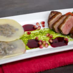 Duck Breast and Cognac Duxelle Wonton Ravioli Recipe with Pomegranate Cognac Sauce and Basil Pesto.