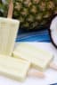 Pina Colada Creamsicle with fresh pineapple, coconut milk, and rum extract. This popsicle is the perfect cool treat on a hot summer day!