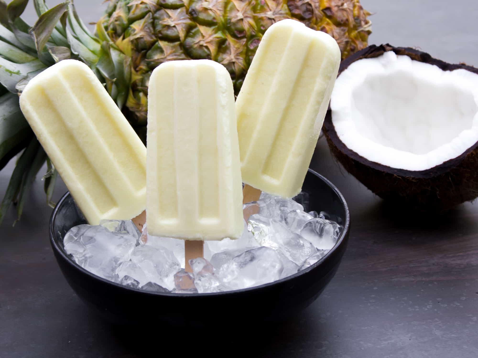 Frozen popsicles with pineapple coconut and rum extract