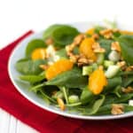 This bright and fresh salad recipe is filled with spinach, celery, green onions, mandarin oranges and candied almonds.