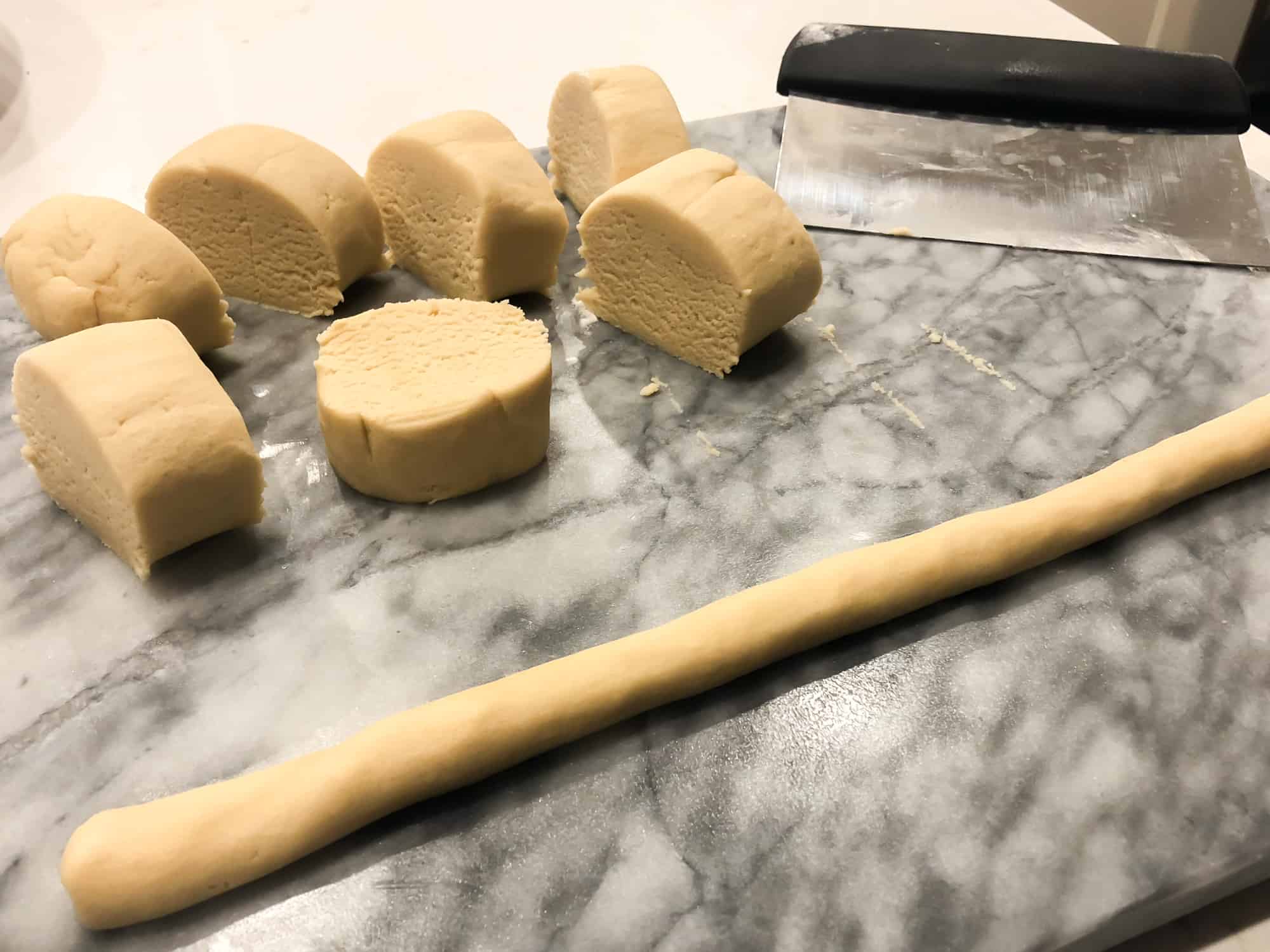 Roll the shortbread cookie dough into log shapes
