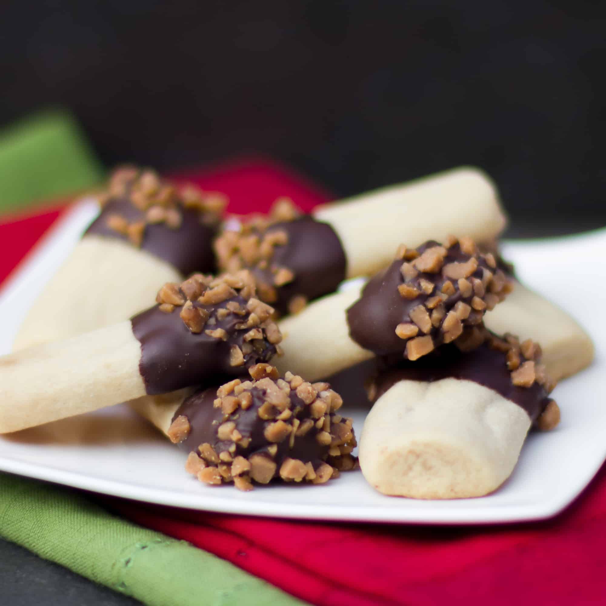 Buttery shortbread cookies dipped in chocolate and Skor toffee bits.