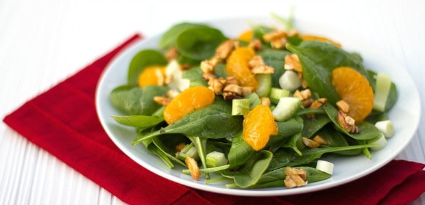 This bright and fresh salad recipe is filled with spinach, celery, green onions, mandarin oranges and candied almonds.