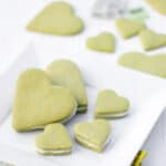 A plate of heart shaped sandwich sugar cookies