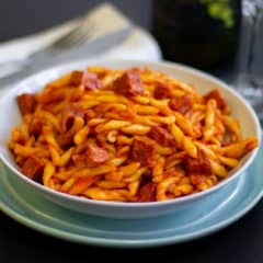 Rustic Italian pasta sauce recipe made with pancetta, mortadella and soppressata salami. Fresh tomatoes, basil, onion and peppers sweeten the sauce.