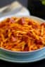 Rustic Italian pasta sauce recipe made with pancetta, mortadella and soppressata salami. Fresh tomatoes, basil, onion and peppers sweeten the sauce.