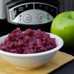 Slow braised red cabbage and apples this German side dish is perfect for the crock pot. Red cabbage, apples, vinegar, onion, sugar. Classic slow cooker recipe.