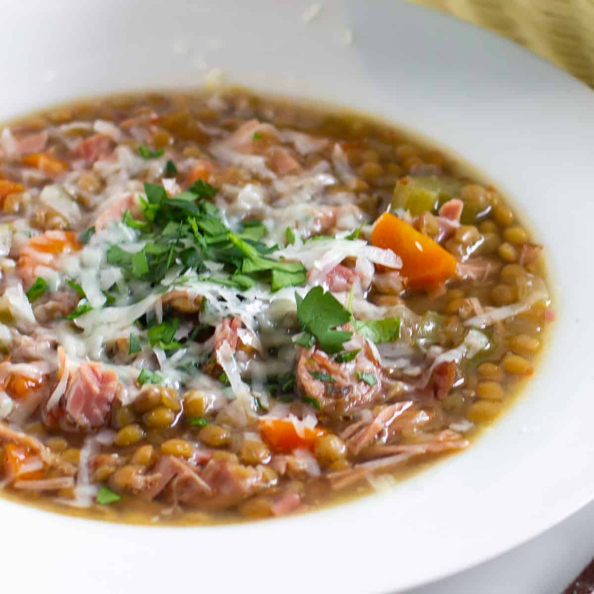 A close up picture of a bowl of soup.